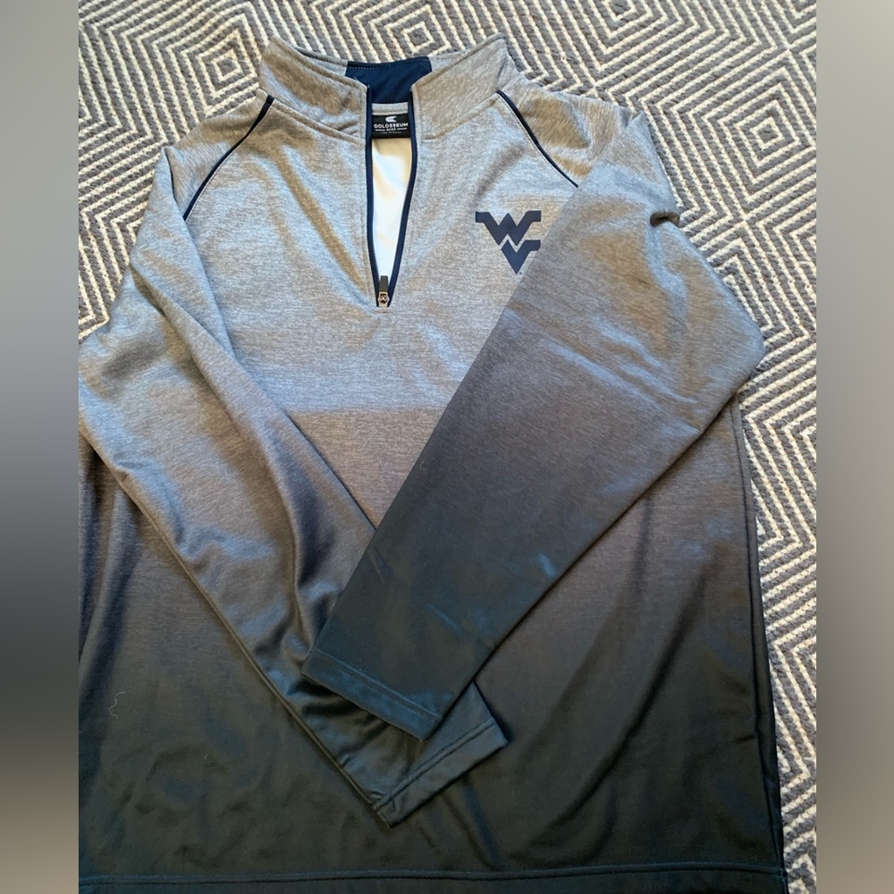 Brand new, tags on it West Virginia University half zip sweatshirt.